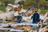 Numerous downed power lines and damaged or demolished buildings have been reported in the Greenback area, which possibly suffered a tornado touchdown late Wednesday, March 23, 2011, according to emergency dispatchers.