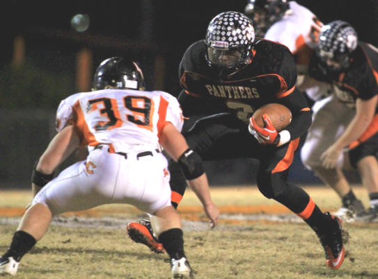 Lenoir City's Daron Stachowicz, left, tries to stop Powell's Dy'shawn Mobly on Friday, November 18, 2011 at Powell High School.