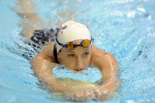 MICHAEL PATRICK/NEWS SENTINEL
Lenoir City's Claire Donahue works out with her U.S. Olympic teammates at the University of Tennessee's Allan Jones Aquatic Center on July 12. Donahue made the team in the 100 fly.
