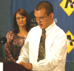 Joe Polakiewicz speaks out for teen auto safety at an Advocates for Highway and Auto Safety press conference in Washington, D.C. Polakiewicz became an advocate on the importance of safe driving following his own severe auto accident in October 2010. Looking on is his mother, Nancy. (Elijah Herington/ SHFWire)
