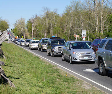 Traffic back-up on two-lane Sudley Road near the Stone House in Manassas battlefield park.